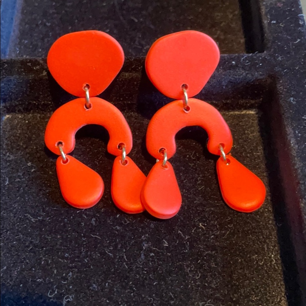 Sigfus design red-orange polymer clay earring